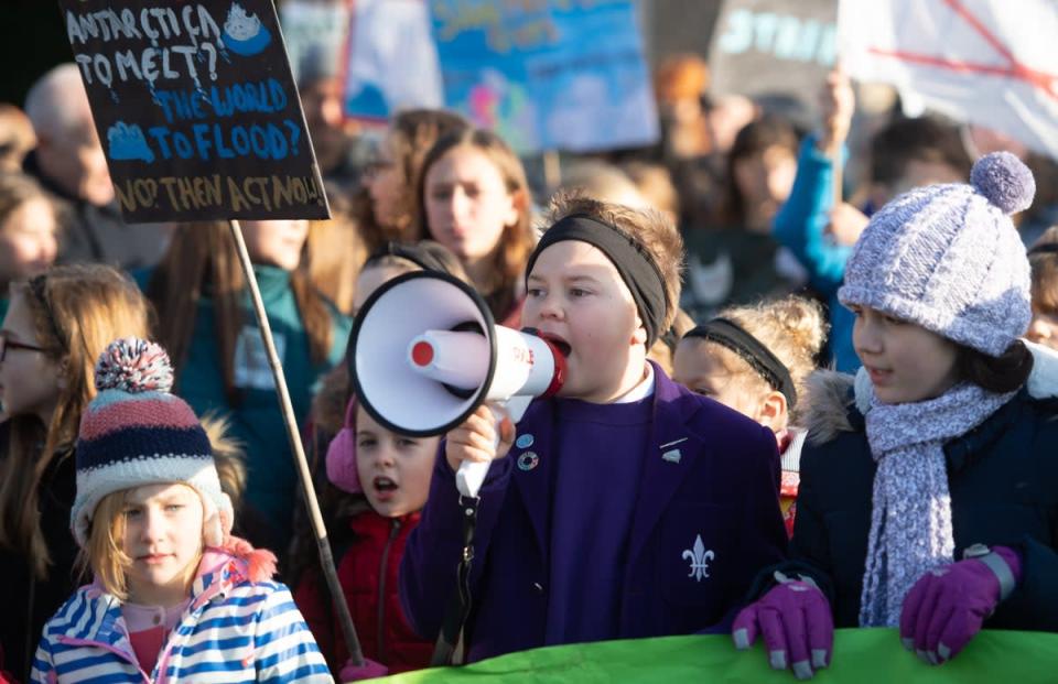 Children take part in the YouthStrike4Climate march (Joe Giddens/PA) (PA Archive)