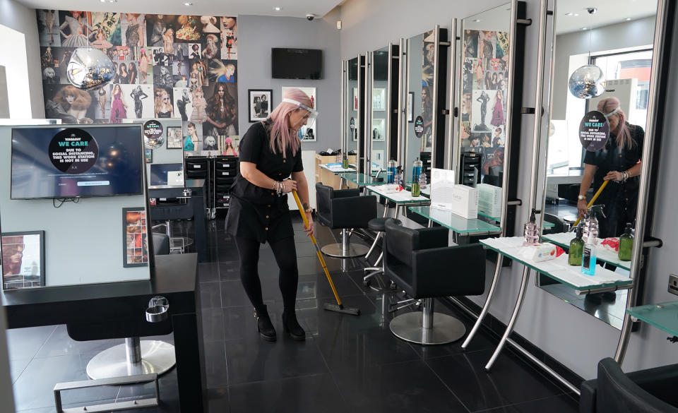 Stylist Caroline Peacock, 41, puts the final preparations in place at Toni & Guy in Newcastle