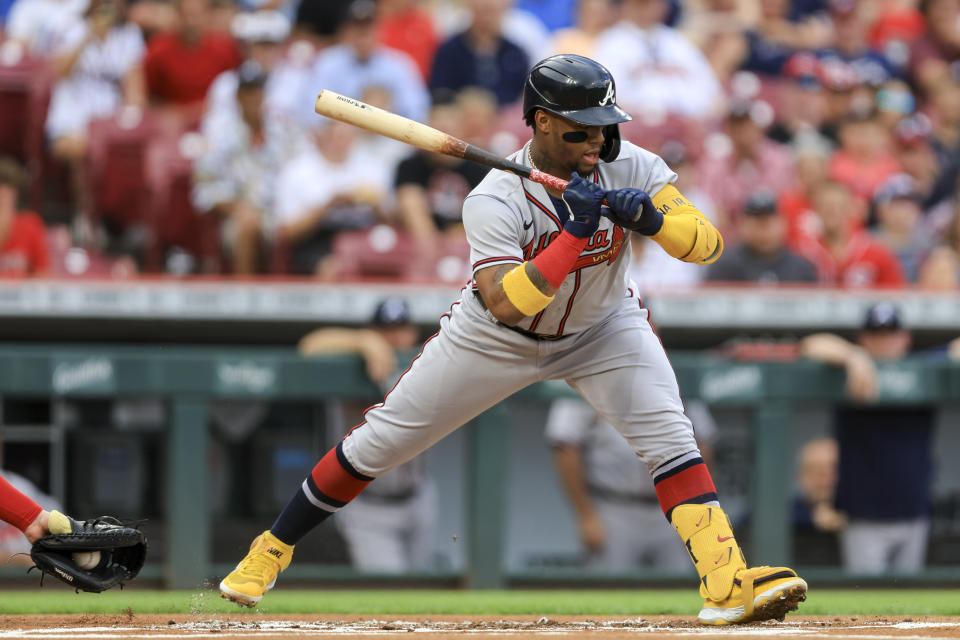 Atlanta Braves' Ronald Acuna Jr. reacts to being hit by a pitch during the first inning the team's baseball game against the Cincinnati Reds in Cincinnati, Friday, July 1, 2022. (AP Photo/Aaron Doster)