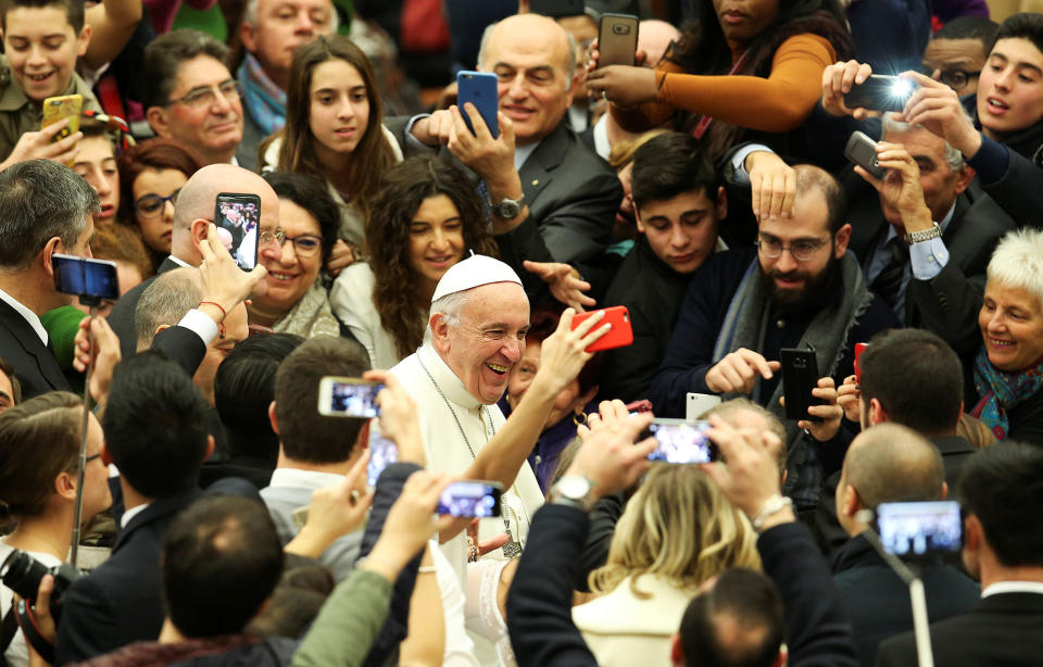 Pope Francis arrives to lead his Wednesday general audience at the Vatican