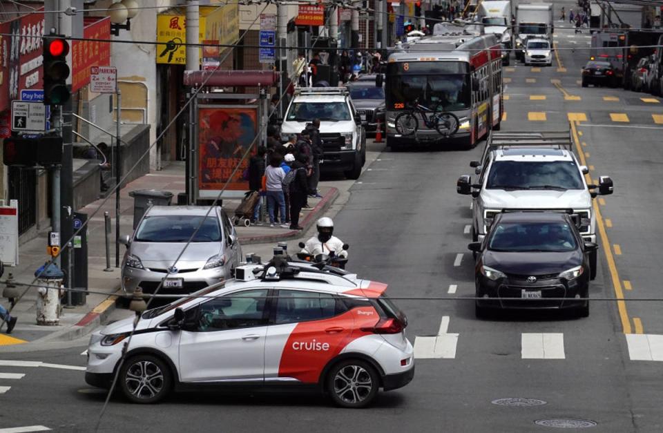 A Chevrolet Cruise autonomous vehicle with a driver moves through an intersection in San Francisco (Getty Images)