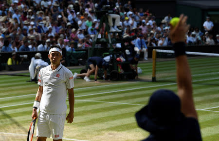 Tennis - Wimbledon - All England Lawn Tennis and Croquet Club, London, Britain - July 11, 2018 Japan's Kei Nishikori during his quarter final match against Serbia's Novak Djokovic REUTERS/Tony O'Brien