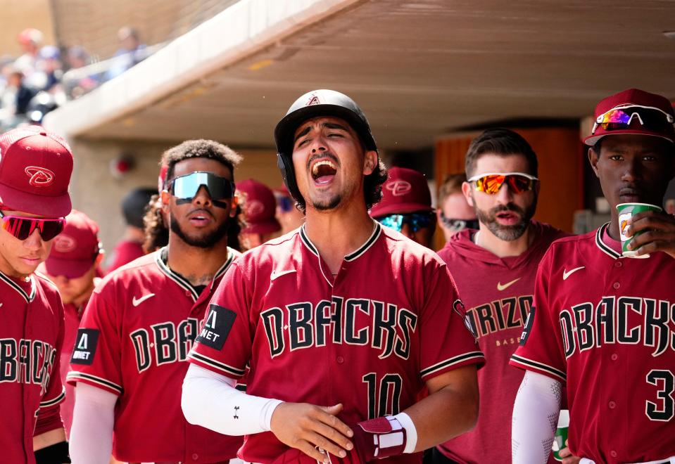 Mar 23, 2023; Scottsdale, AZ, USA; Arizona Diamondbacks Josh Rojas (10) reacts after scoring on an RBI-single by Evan Longoria against the Los Angeles Dodgers in the first inning during a spring training game at Salt River Fields. Mandatory Credit: Rob Schumacher-Arizona Republic