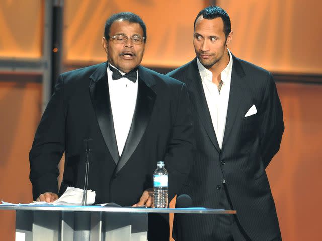 <p>MediaPunch/Shutterstock</p> Rocky Johnson (left) and Dwayne Johnson in 2008