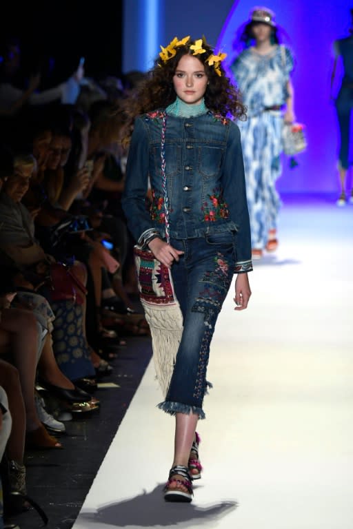 A model walks the runway at Jeans For Refugees By Johny Dar during New York Fashion Week: The Shows September 2016 at The Arc