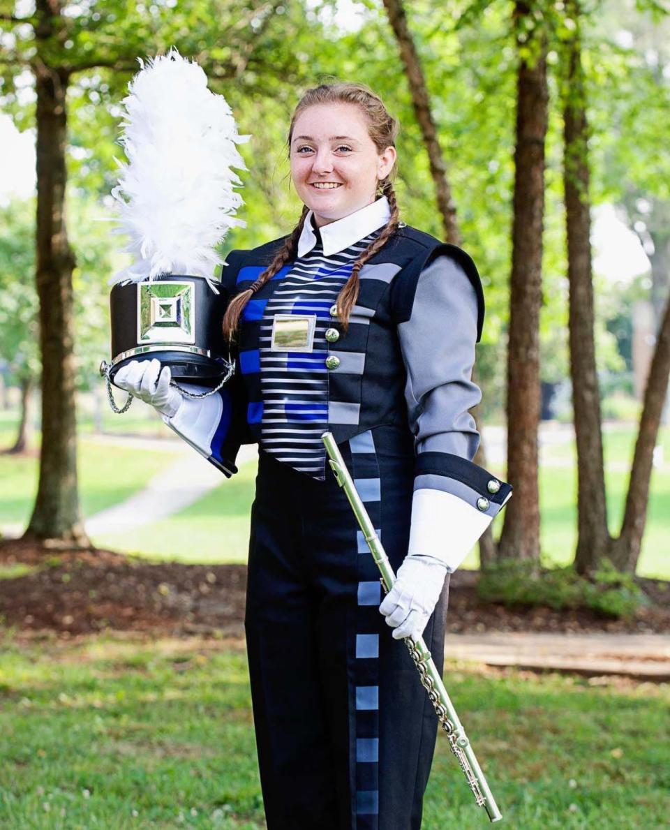 Ella Pinchok plays flute and piccolo in the Farragut High School marching and concert band during her junior year, fall 2021. Photo by Susan Kohlstedt