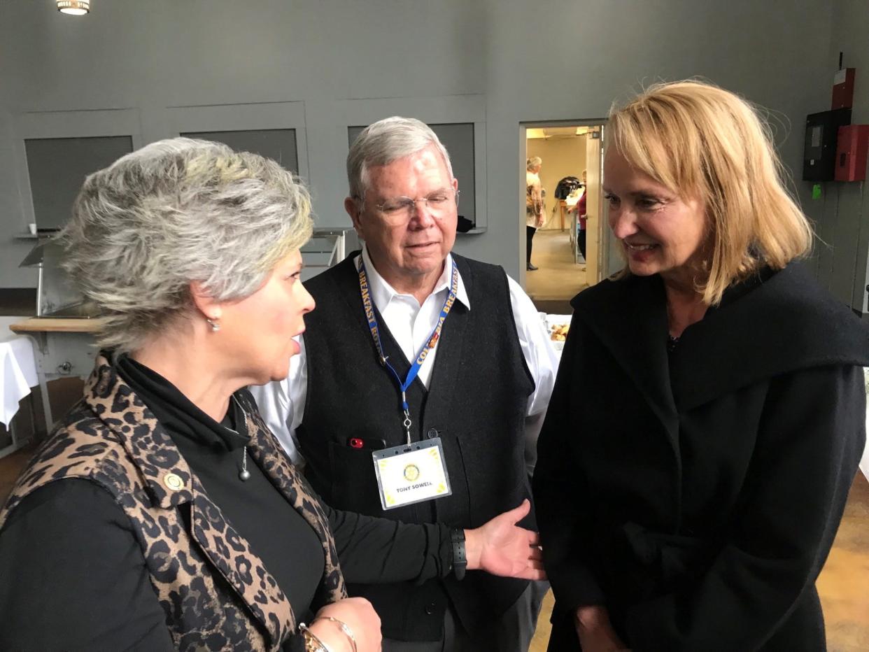 Former House Speaker Beth Harwell visits the Memorial Building in Maury County for the annual State Eggs & Issues breakfast. Maury County Chamber director Kara Williams (left) and Tony Sowell of the Columbia Rotary Club greet Harwell.
