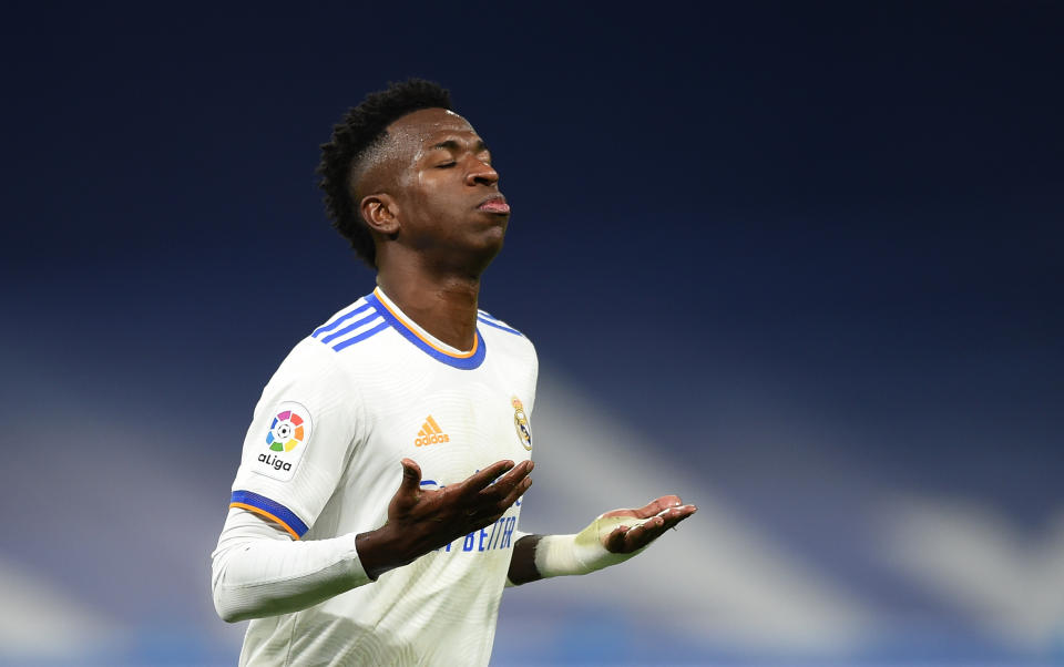 MADRID, SPAIN - NOVEMBER 28: Vinicius Junior of Real Madrid reacts during the La Liga Santander match between Real Madrid CF and Sevilla FC at Estadio Santiago Bernabeu on November 28, 2021 in Madrid, Spain. (Photo by Denis Doyle/Getty Images)