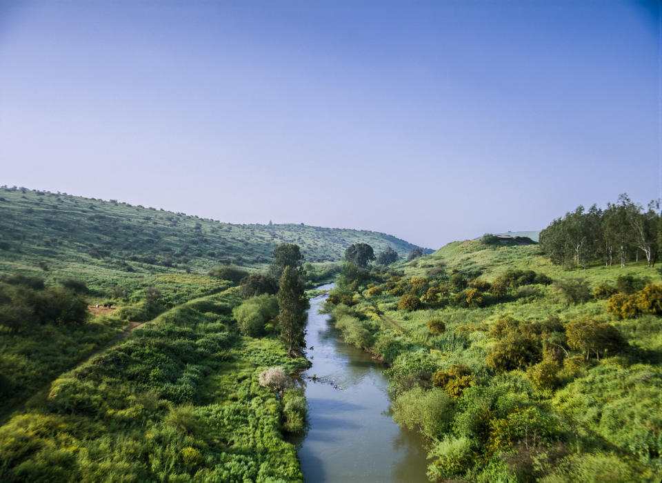 An aerial view of the Jordan River, which lies about 30km (20mi) East of Jerusalem and flows from north of the Sea of Galilee to the Dead Sea. 