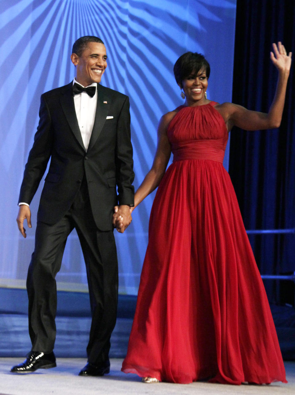 Former President Barack Obama and former first lady Michelle Obama will be developing content for Netflix, the company announced Monday. (AP Photo/Carolyn Kaster, File)