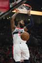 Oct 22, 2018; Portland, OR, USA; Washington Wizards forward Markieff Morris (5) dunks the basketball during the first half against the Portland Trail Blazers at Moda Center. Mandatory Credit: Troy Wayrynen-USA TODAY Sports