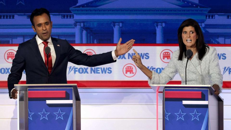 PHOTO: Republican presidential candidates, Vivek Ramaswamy (L) and former U.N. Ambassador Nikki Haley participate in the first debate of the GOP primary season hosted by FOX News at the Fiserv Forum on August 23, 2023 in Milwaukee, Wisconsin. (Win Mcnamee/Getty Images)