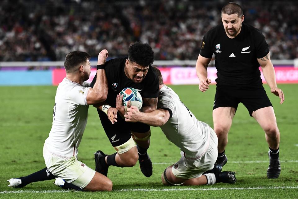 New Zealand's flanker Ardie Savea (2nd L) scores a try during the Japan 2019 Rugby World Cup semi-final match between England and New Zealand at the International Stadium Yokohama in Yokohama on October 26, 2019. (Photo by Anne-Christine POUJOULAT / AFP) (Photo by ANNE-CHRISTINE POUJOULAT/AFP via Getty Images)