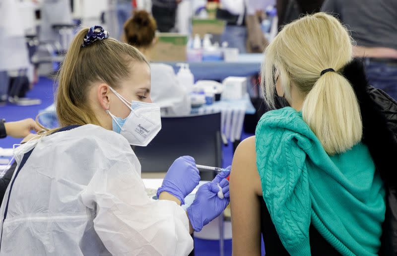 Woman receives a dose of the COVID-19 vaccine at a vaccination center in Zagreb