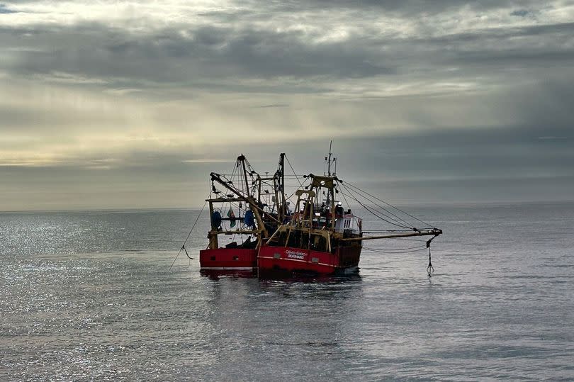 Work to jettison the dredging nets went on into the evening