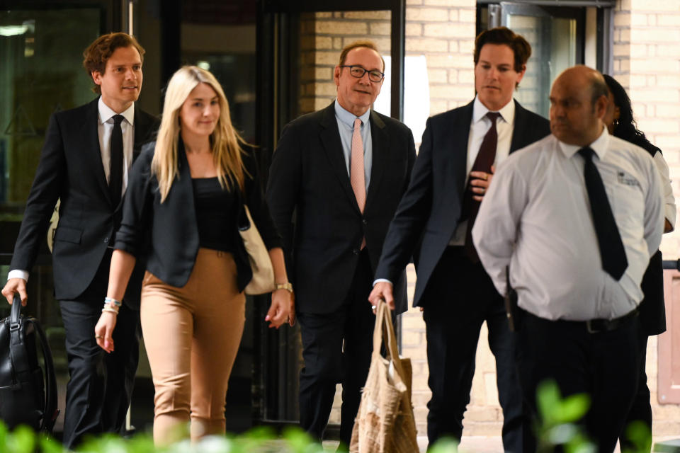 US actor Kevin Spacey (C) leaves Southwark Crown Court in London on June 28, 2023.