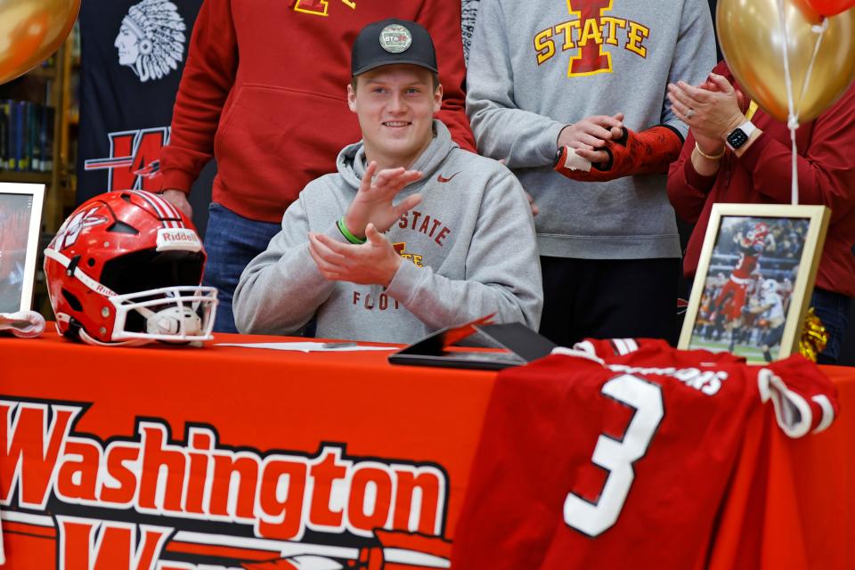 Washington's Cooper Alexander smiles after signing with Iowa State on Dec. 19 in Washington.