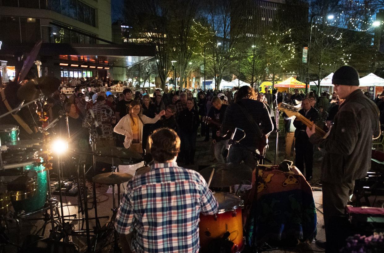 The Grateful Brothers played at the first Piedmont Natural Gas Downtown Alive of 2019 in NOMA Square Thursday, Mar. 21, 2019.