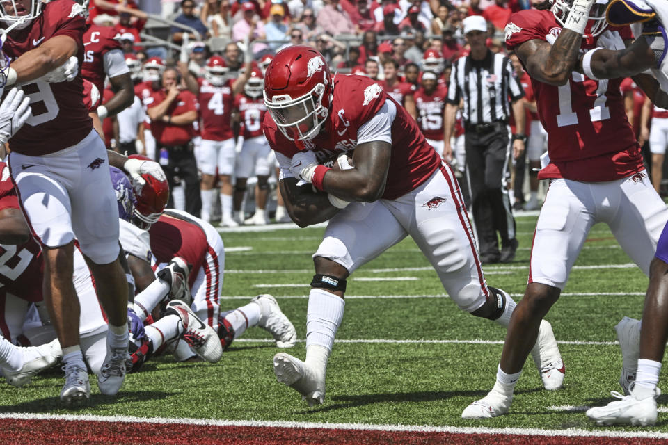 Arkansas running back Raheim Sanders (5) runs for a touchdown against Western Carolina during the first half of an NCAA college football game Saturday, Sept. 2, 2023, in Little Rock, Ark. (AP Photo/Michael Woods)