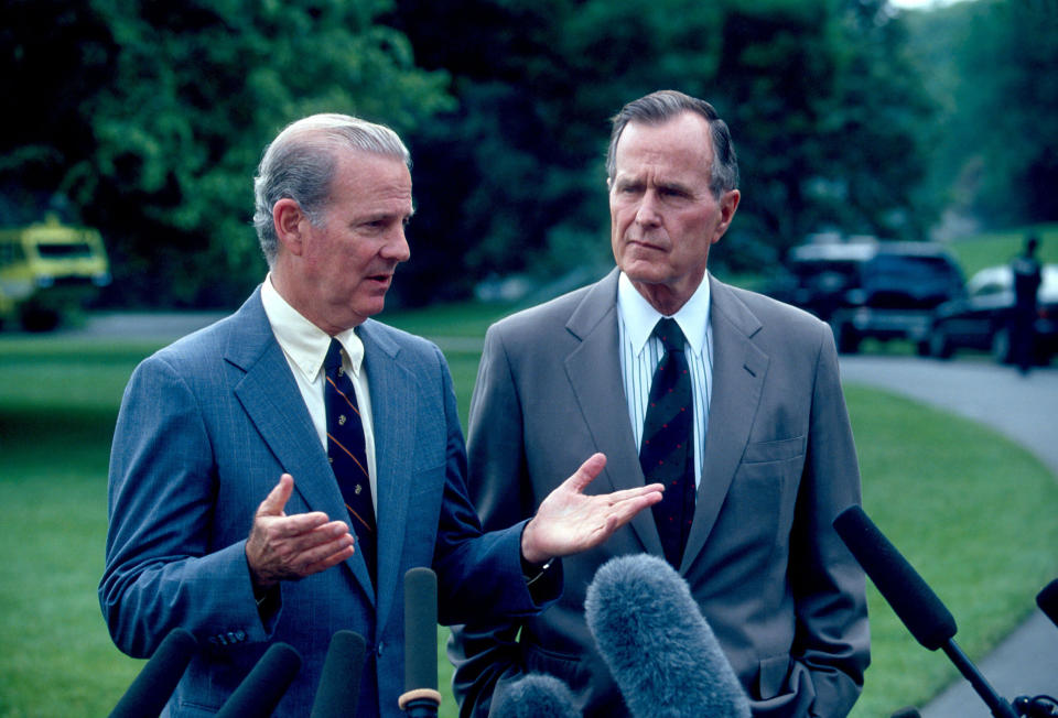 Secretary of State James A. Baker III and President George H.W. Bush speak to the press in May 1991. After the first Gulf War, Bush sought to achieve Palestinian-Israeli peace. (Photo: Diana Walker/Getty Images)