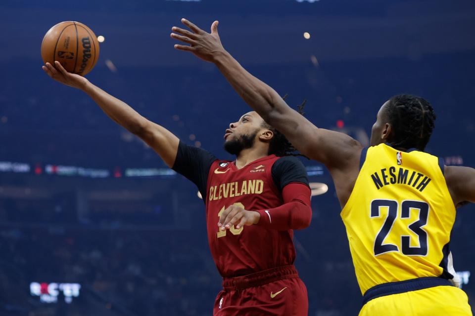 Cleveland Cavaliers guard Darius Garland (10) shoots against Indiana Pacers forward Aaron Nesmith (23) during the first half Sunday, April 2, 2023, in Cleveland.