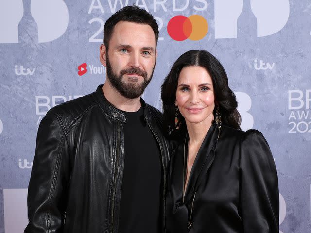 JMEnternational/Getty From left: Johnny McDaid and Courteney Cox attend The BRIT Awards 2022 at The O2 Arena on February 08, 2022 in London, England