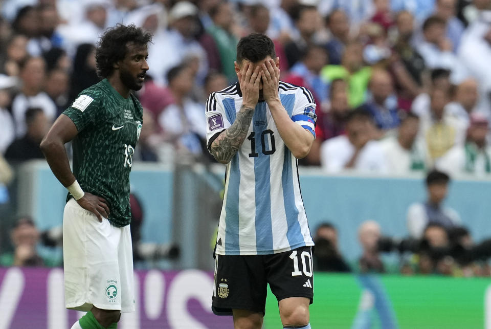 Argentina's Lionel Messi reacts disappointed during the World Cup group C soccer match between Argentina and Saudi Arabia at the Lusail Stadium in Lusail, Qatar, Tuesday, Nov. 22, 2022. (AP Photo/Natacha Pisarenko)