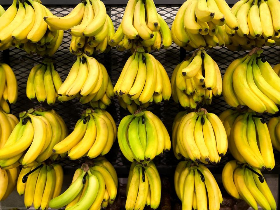 rows of fresh bananas for sale