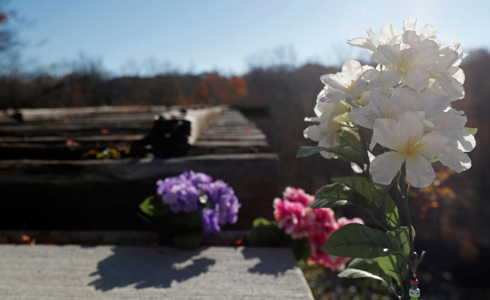 Flowers are set up in honor of Abby Williams and Libby German. The two went missing on the Monon High Bridge Trail on Feb. 13, 2017. A press conference will be held Monday to address the ongoing investigation. Photo taken, Saturday, Oct. 29, 2022, in Delphi, Ind. 