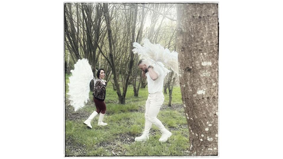 Janette Manrara and John Whaite wearing angel wings