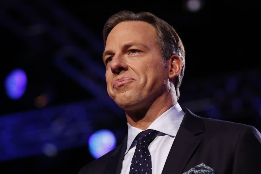 Jake Tapper moderates the Republican primary debate hosted by CNN