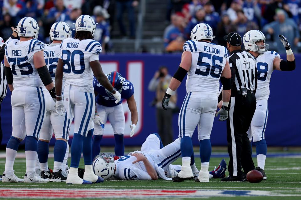 EAST RUTHERFORD, NEW JERSEY - JANUARY 01: Nick Foles #9 of the Indianapolis Colts is injured against the New York Giants during the second quarter at MetLife Stadium on January 01, 2023 in East Rutherford, New Jersey.