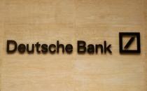 FILE PHOTO: The logo of Deutsche Bank is pictured on a company's office in London