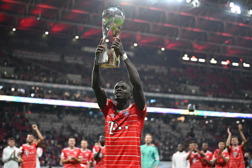 LEIPZIG, GERMANY - JULY 30: Sadio Mane lifts the trophy after the victory ceremony after the Supercup 2022 match between RB Leipzig and FC Bayern München at Red Bull Arena on July 30, 2022 in Leipzig, Germany. (Photo by Marvin Ibo Guengoer - GES Sportfoto/Getty Images)