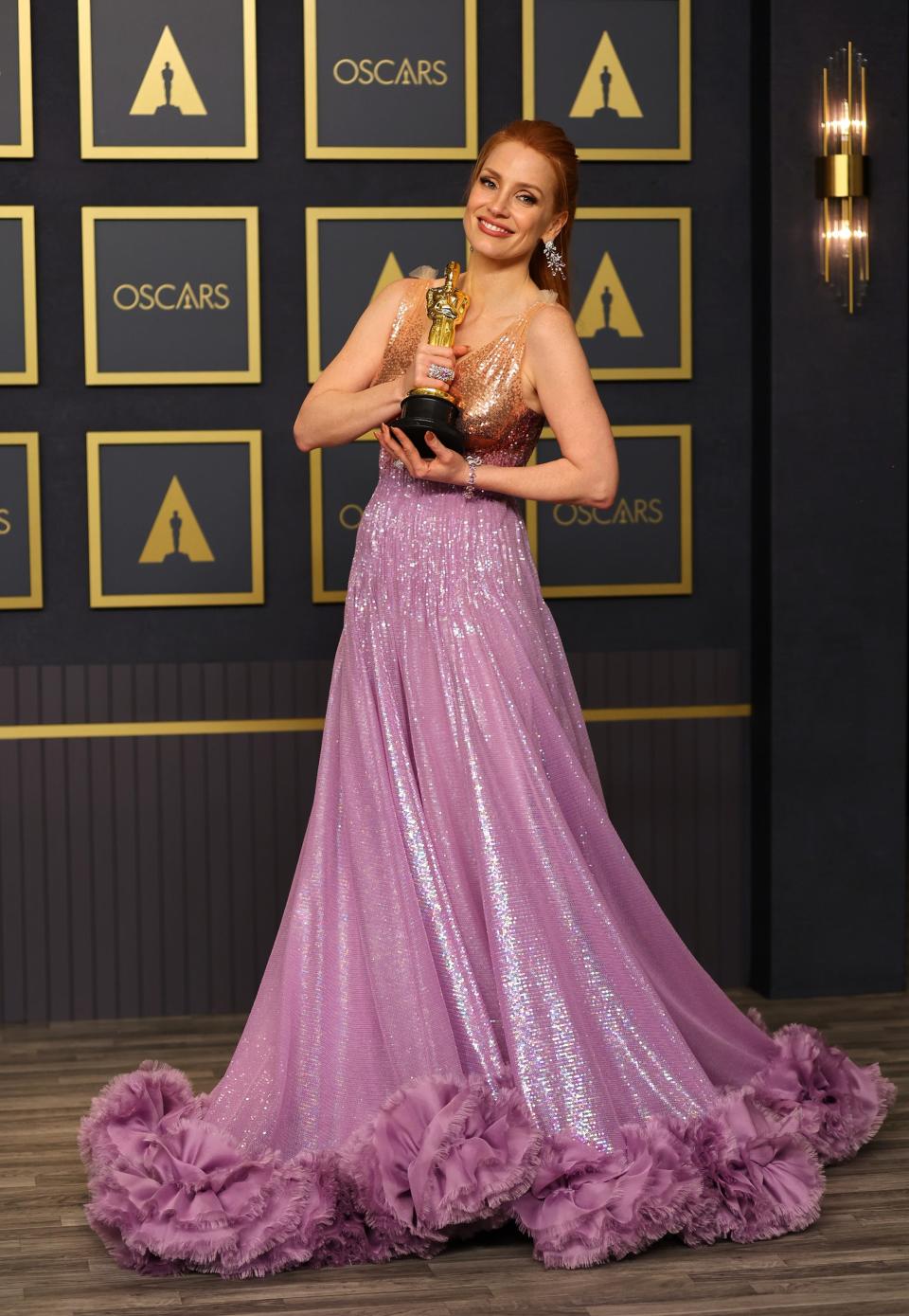 essica Chastain, winner of the Actress in a Leading Role award for ‘The Eyes of Tammy Faye’ poses in the press room during the 94th Annual Academy Awards at Hollywood and Highland on March 27, 2022 in Hollywood, California