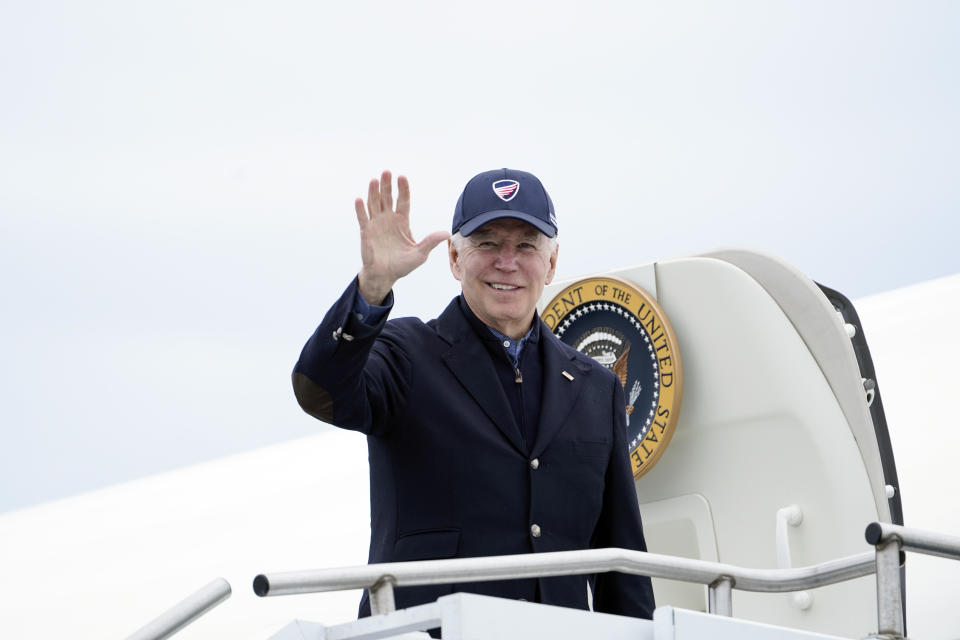 President Joe Biden waves before boarding Air Force One at Nantucket Memorial Airport in Nantucket, Mass., Sunday, Nov. 27, 2022.  / Credit: Susan Walsh / AP