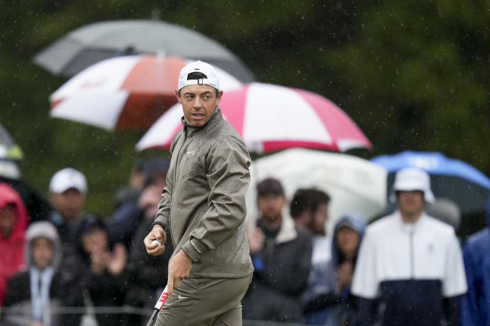 Rory McIlroy, of Northern Ireland, putts on the second hole during the third round of the PGA Championship golf tournament at Oak Hill Country Club on Saturday, May 20, 2023, in Pittsford, N.Y. (AP Photo/Seth Wenig)