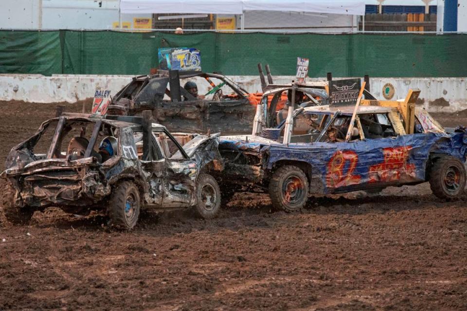 Ryan Chivers (82) defeats John Daley (7) in a head-on collision to win the demolition derby at Rodeo Arena inside the California State Fair on Saturday, July 22, 2023, in Sacramento.



