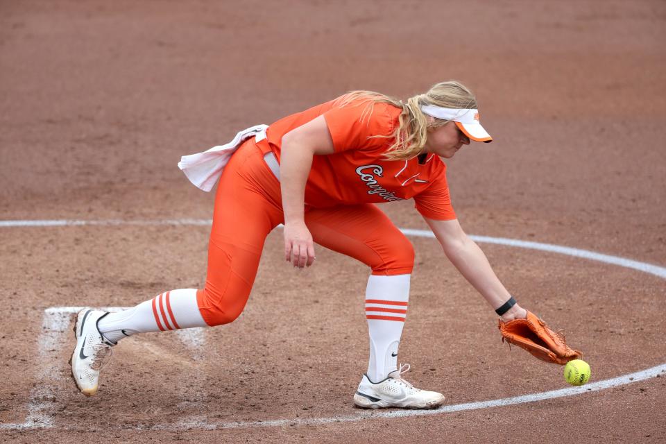 OSU pitcher Lexi Kilfoyl (8) fields the ball during a 3-0 win against Texas on Saturday at Cowgirl Stadium in Stillwater.