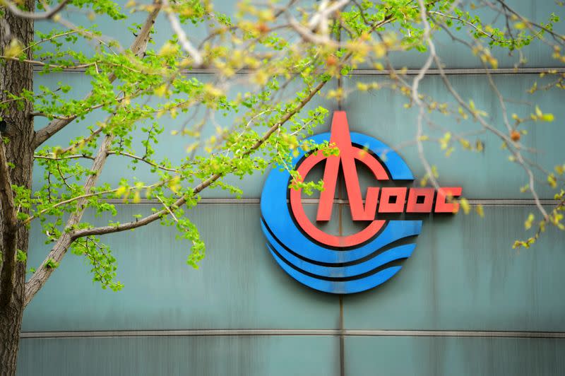 FILE PHOTO: The logo of China National Offshore Oil Corp (CNOOC) is pictured at its headquarters in Beijing