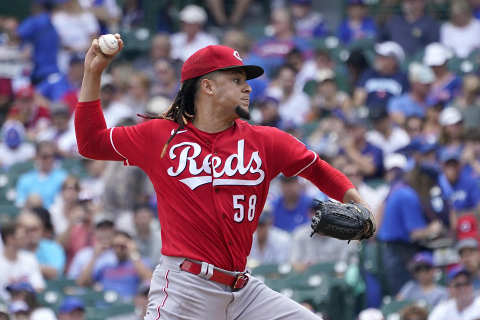 Cincinnati Reds starting pitcher Luis Castillo delivers during the first inning of a baseball game against the Chicago Cubs Thursday, July 29, 2021, in Chicago. (AP Photo/Charles Rex Arbogast)