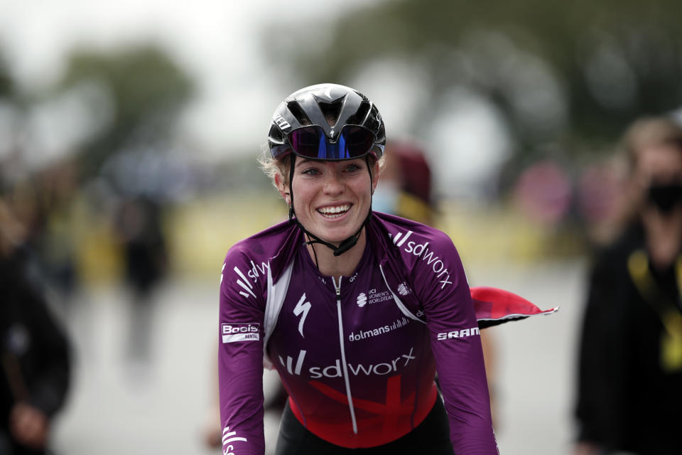 Netherland's Demi Vollering of the SD Worx smiles after she won La Course by Le Tour de France women's cycling race, in Landernau, France, Saturday, June 26, 2021. (Benoit Tessier, Pool Photo via AP)