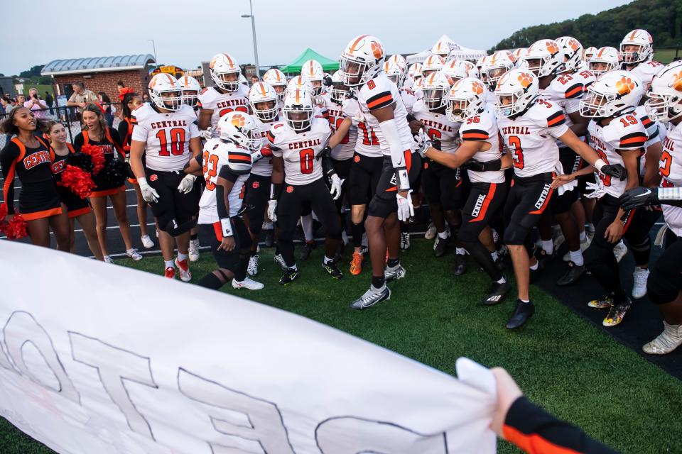 Central York's Saxton Suchanic (8) leads the Panthers onto the field to play Spring Grove in a YAIAA Division I football game at Papermakers Stadium on Friday, September 16, 2022.