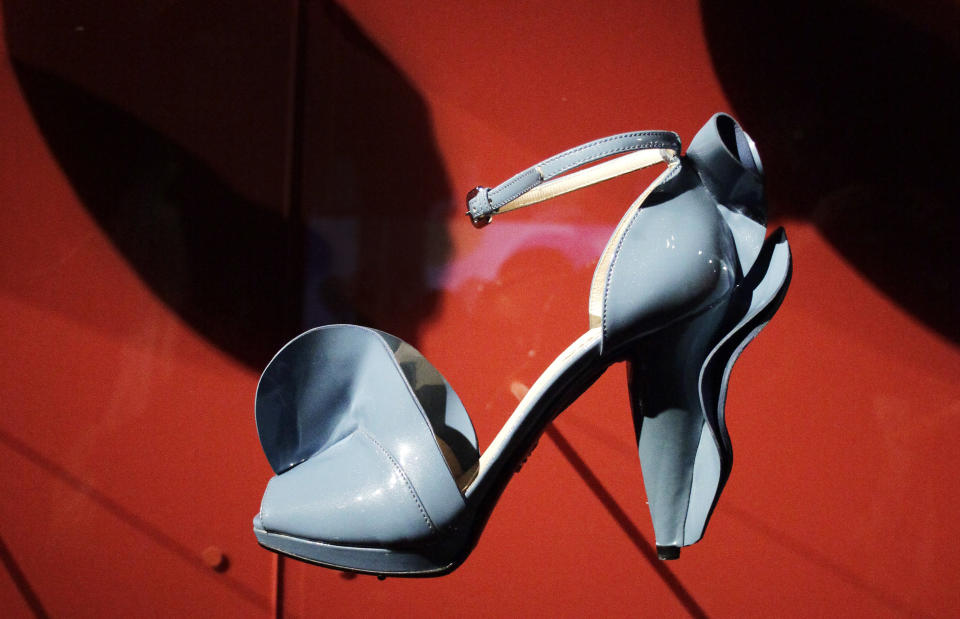 A shoe designed by Miuccia Prada is displayed at the Metropolitan Museum of Art, Monday, May 7, 2012 in New York. The show "Schiaparelli and Prada, Impossible Conversations," opens May 10 and continues through Aug. 19. (AP Photo/Mark Lennihan)