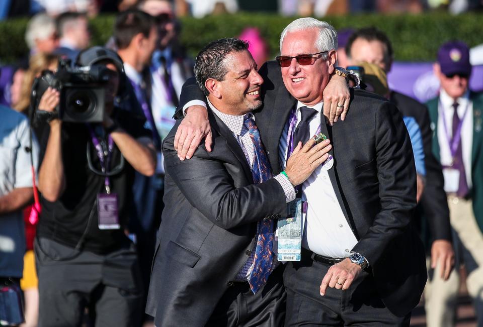 Owner Mike Repole hugs trainer Todd Pletcher after their horse  Forte won the Breeders' Cup $2 million Juvenile Grade 1 at the Breeders' Cup World Championships at Keeneland in Lexington, Ky. Nov. 4, 2022. 
