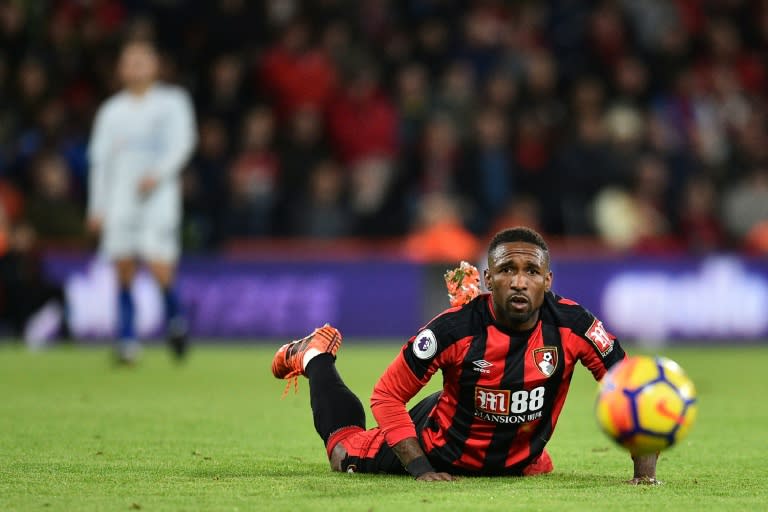 Bournemouth's Jermain Defoe trips during their English Premier League match against Chelsea, at the Vitality Stadium in Bournemouth, on October 28, 2017