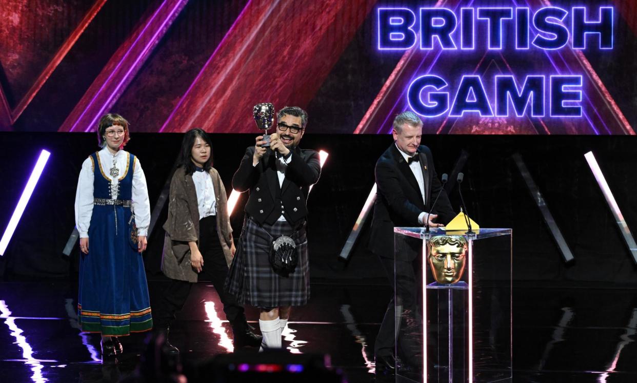 <span>Fierce competition … Georg Backer accepts the British game award for Viewfinder at the ceremony.</span><span>Photograph: Stuart Wilson/BAFTA/Getty Images for BAFTA</span>