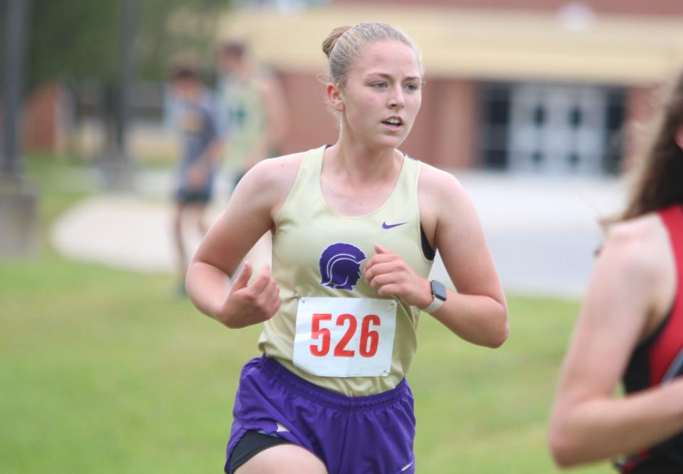 Fowlerville's Delaney Richardson competes in the CAAC Red cross country jamboree Tuesday, Sept. 19, 2023 at Howell High School.