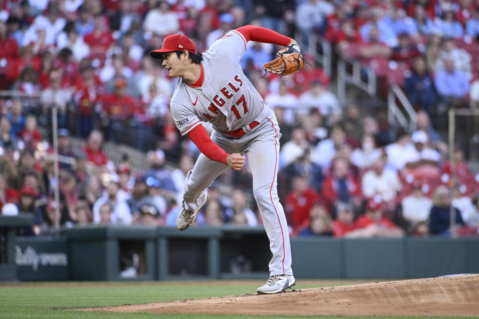 Los Angeles Angels starting pitcher Shohei Ohtani throws in the first inning of a baseball game against the St. Louis Cardinals on Wednesday May 3, 2023, in St. Louis. (AP Photo/Joe Puetz)