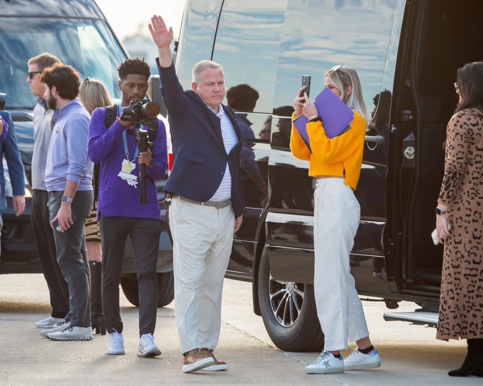 Brian Kelly, named LSU head football coach, arrives at the Baton Rouge Airport on Tuesday.